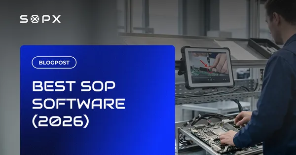 Operator using SOP software on a tablet beside manufacturing equipment.