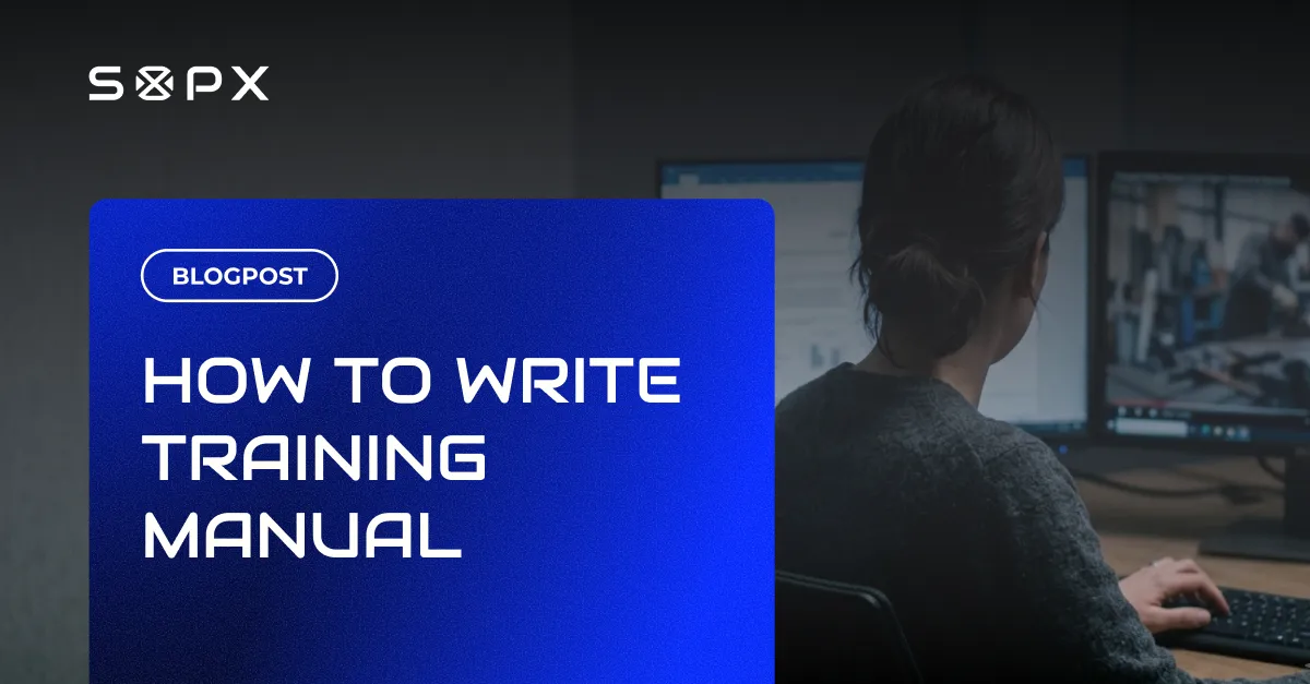 Woman at a computer writing a training manual at her desk.