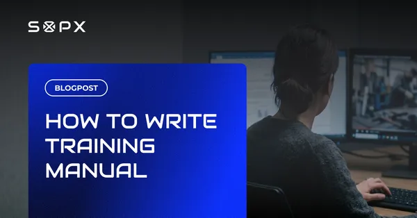Woman at a computer writing a training manual at her desk.