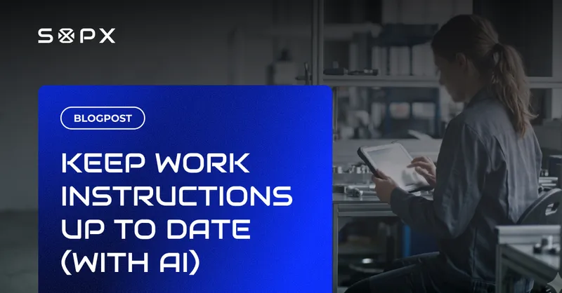 Operator reviewing up to date digital work instructions on a tablet at a manufacturing workstation.